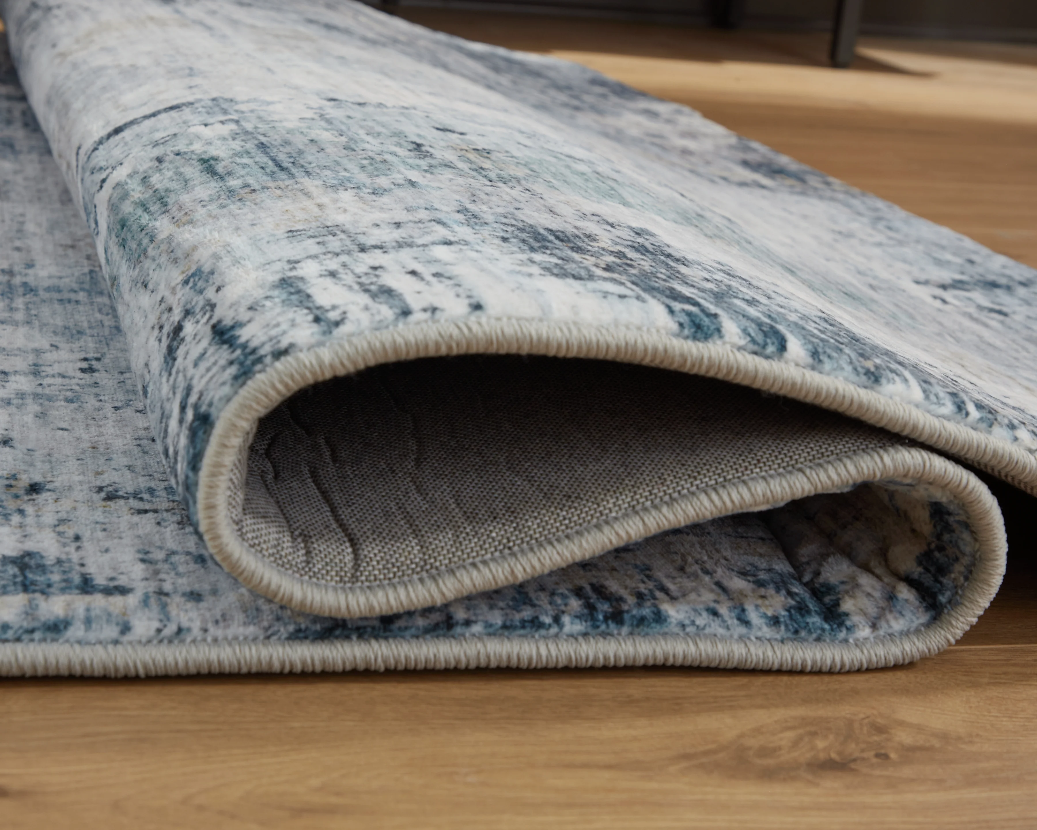 Arlenmont Blue/White/Brown Memory Foam Medium Rug - Image 4