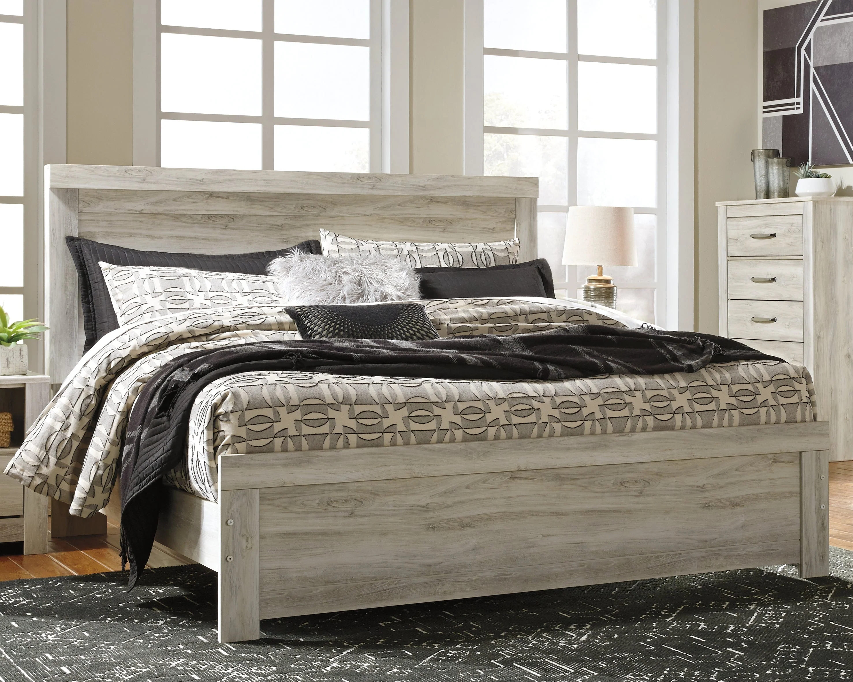 Bellaby Whitewash King Panel Bedroom Set with Dresser, Mirror, Chest and 2 Nightstands (Online Special Price) - Image 11
