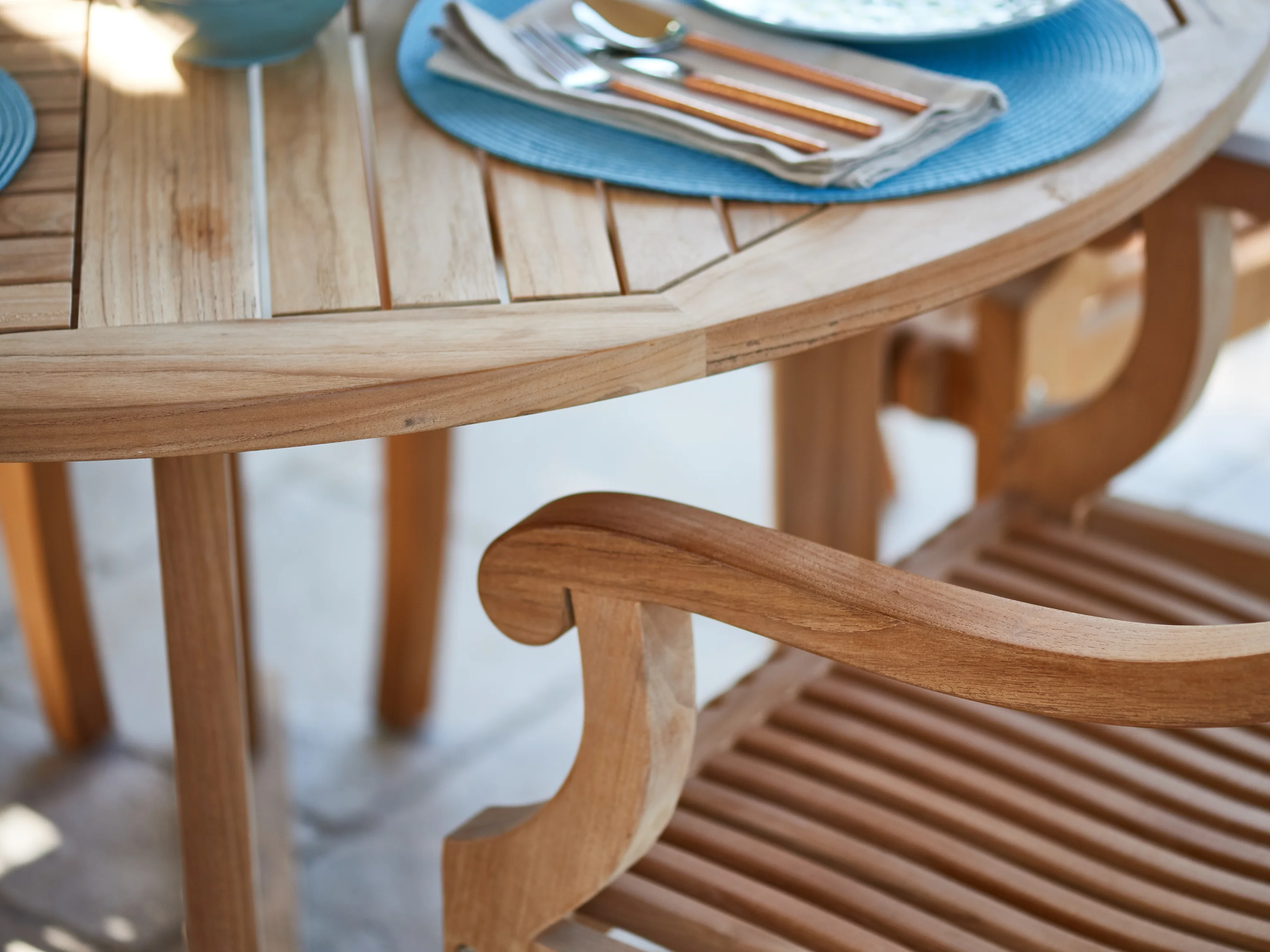 Curtis 47.25-inch Round Teak Outdoor Dining Table with Umbrella Hole - Image 6
