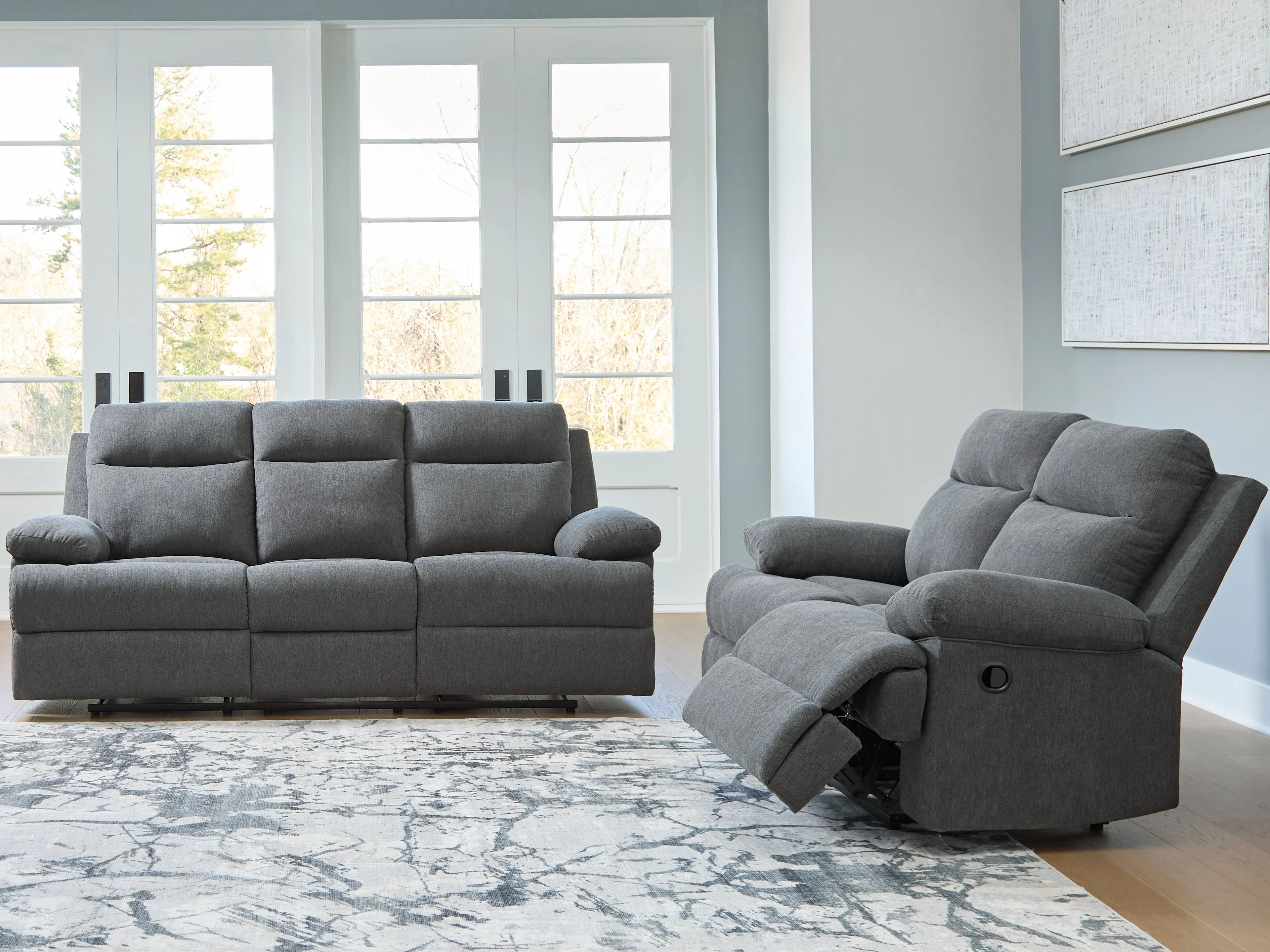 Side-Swipe Charcoal Reclining Sofa and Loveseat (Online Special Price)